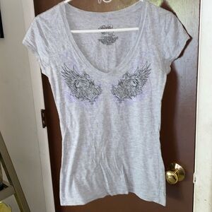 Women’s gray short sleeve with tattoo style designs on the front and the back